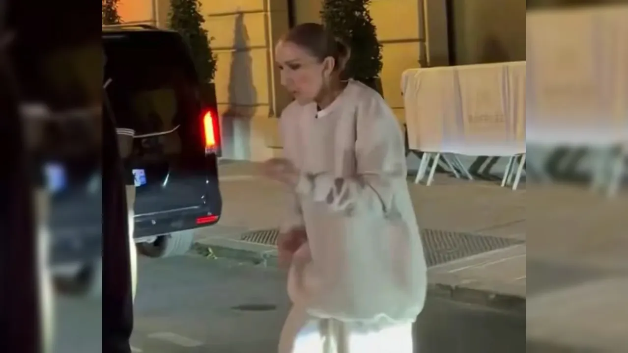 Celine Dion in paris dancing for fans