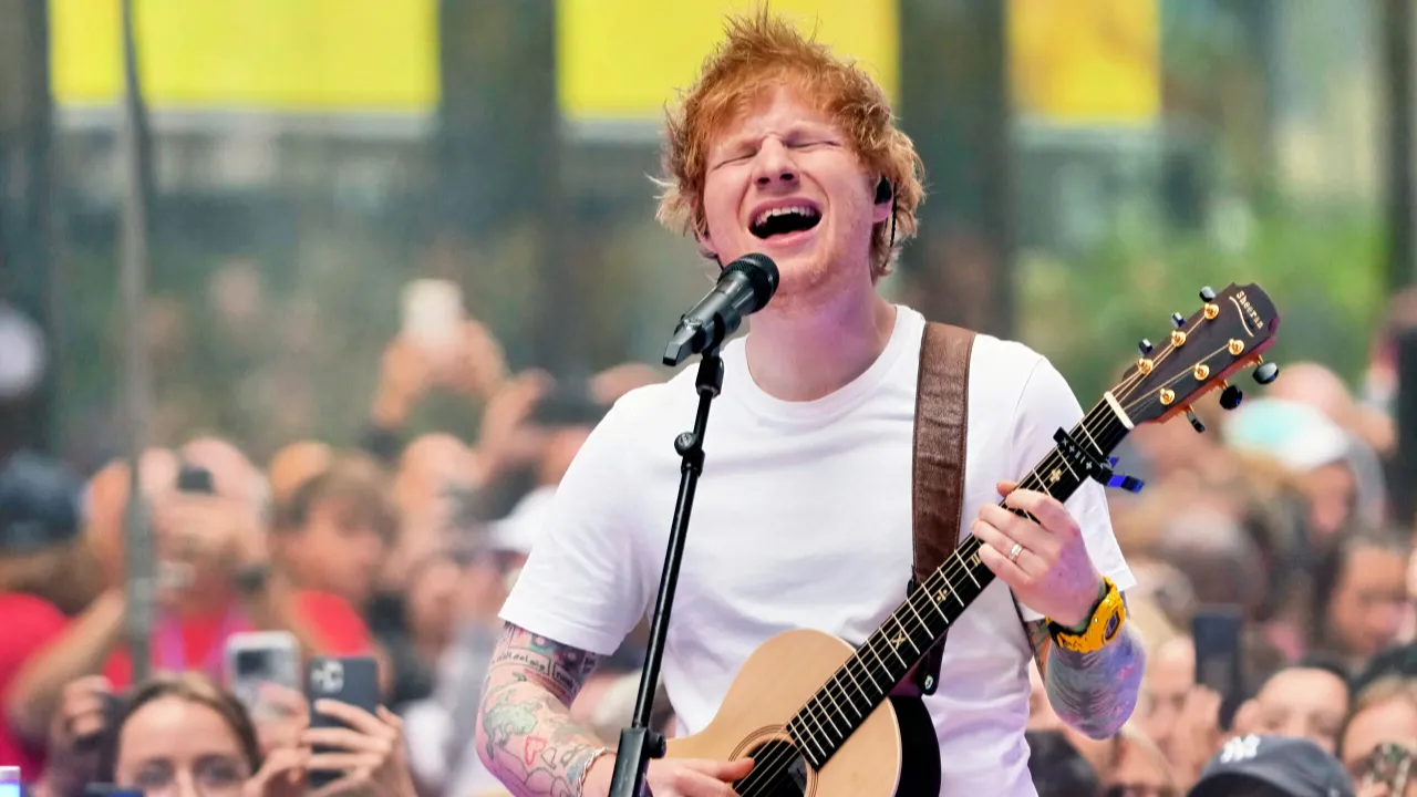 Ed Sheeran singing in his tour